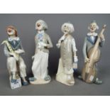 Four Spanish porcelain figurines of clowns by Casades, largest approximately 29 cm (h).