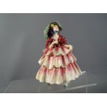 Royal Doulton - a figurine entitled 'The Hinged Parasol' # HN 1578,