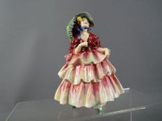 Royal Doulton - a figurine entitled 'The Hinged Parasol' # HN 1578,