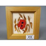 Moorcroft Pottery - a framed plaque decorated in the Harvest Poppy pattern,