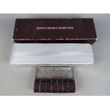 A boxed set of Wills's Star Cigarettes dominoes,