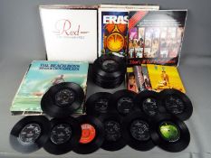 A quantity of 12" and 7" vinyl records to include The Beatles, The Kinks, The Rolling Stones,