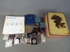 A collection of coins, commemorative crowns, decimal coin sets and similar.