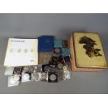 A collection of coins, commemorative crowns, decimal coin sets and similar.