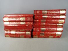 Twelve volumes of Everymans Encyclopedia and three of Antique Maps Of Britain, two boxes.