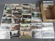 In excess of 400 UK topographical postcards to include real photos and street scenes,