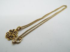 9 ct Gold - a 9ct hallmarked necklace with stone set hallmarked pendant (375) approximate weight 4.