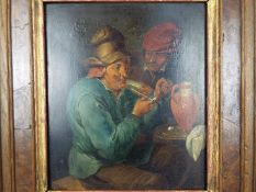 A framed oil on board depicting two peasants in a tavern interior, after Thomas Van Apshoven,