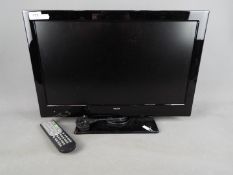 A Bush 22" television / DVD player combination, with remote.