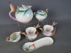 Franz - A quantity of Franz Fine Porcelain tea wares from the Papillon collection comprising teapot,