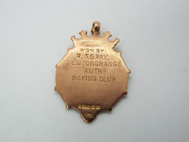 A 9ct gold Newtongrange Amateur Boxing Club medal, approximately 8.1 grams all in. - Image 2 of 2