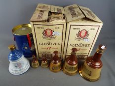 A boxed 75 cl Bells Old Scotch Whisky decanter, Queen Mother 90th Birthday commemorative,
