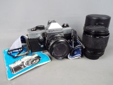 Photography - A Praktica MTL5 camera with Carl Zeiss Jena Tessar 2.