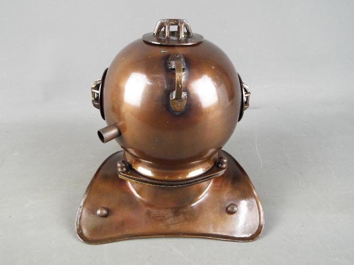 A metal reproduction of a diver's helmet, - Image 4 of 4