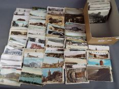 In excess of 500 postcards to include topographical and early-mid century period to include real