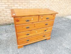 A chest of two over three drawers, approximately 85 cm x 106 cm x 50 cm.