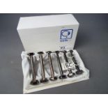 A set of six silver plated knife rests by Gelb of Paris, contained in original box.