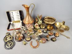 A collection of metalware, cased flatware and animal figurines.