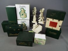 A collection of Department 56 'Snowbabies' figures, predominantly boxed.