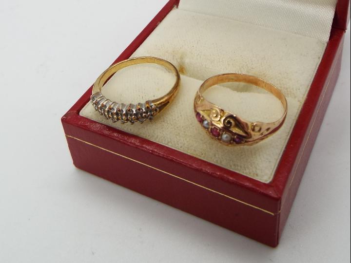 A 9ct gold, garnet and pearl ring size L and a further stone set 9ct gold ring, size I+½,