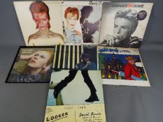 David Bowie - Seven 12" to include The Man Who Sold The World SR-61325, Lodger BOW LP 1,