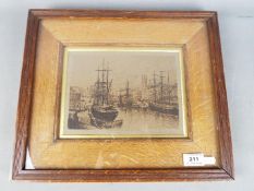 A framed etching after J R Hutchinson entitled 'St Stephens Bristol From The Harbour'.