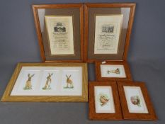 A collection of pictures of animals and two antique copper plate engravings all framed under glass.