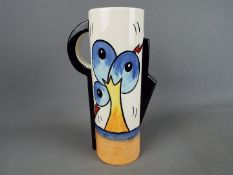Lorna Bailey - A tall, slender jug in the Bursley Way pattern,