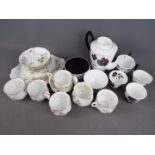 A quantity of Royal Albert 'Masquerade' pattern comprising coffee pot, six saucers, four cups,