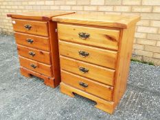 A pair of bedside cabinets with four drawers, approximately 65 cm x 53 cm x 36 cm.