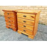 A pair of bedside cabinets with four drawers, approximately 65 cm x 53 cm x 36 cm.