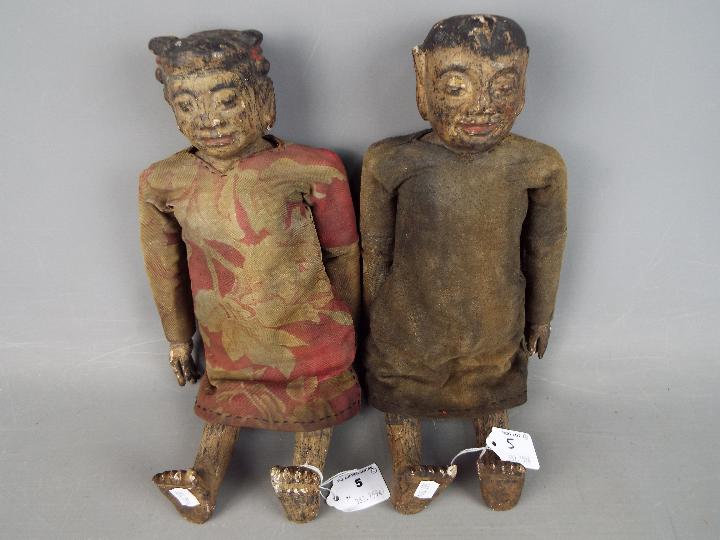 A pair of antique Chinese fertility dolls, late 19th / early 20th century,