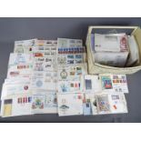 Stamps - a quantity of UK, Channel Islands and Isle of Man stamps to include First Day Covers,