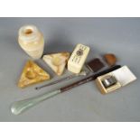 A mixed lot of collectables to include hallmarked silver napkin ring, silver handled button hook,