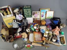 A mixed lot to include Wade Natwest pig money bank, animal ornaments, pictures, gloves,