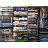 Two boxes of DVD's including films, comedy, animated and similar.