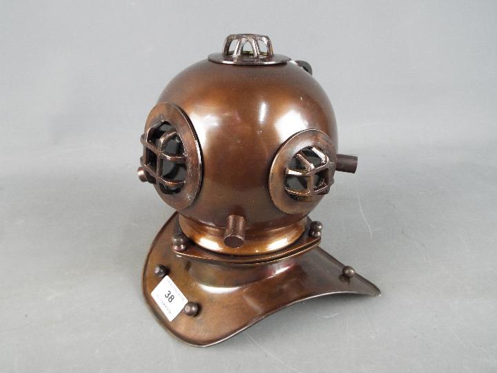 A metal reproduction of a diver's helmet, - Image 3 of 4