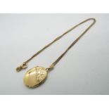 A 9ct gold locket pendant and necklace, 45 cm (l), approximately 6.5 grams all in.