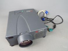 A projector, model 3M MP8670.