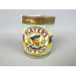 A unopened vintage tin of Players Navy Cut 'Medium' cigarettes containing 50 cigarettes.