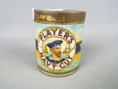 A unopened vintage tin of Players Navy Cut 'Medium' cigarettes containing 50 cigarettes.