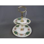 A Royal Albert two tier cake stand in the 'Berkeley' pattern.