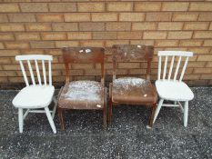 Four small children's chairs.