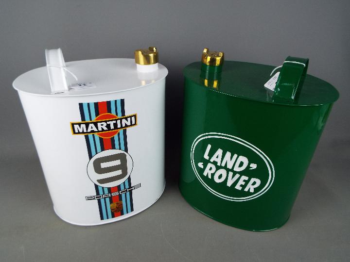 Two reproduction petrol cans, Land Rover and Porsche, approximately 35 cm (h).