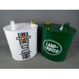 Two reproduction petrol cans, Land Rover and Porsche, approximately 35 cm (h).