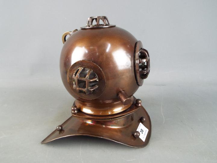 A metal reproduction of a diver's helmet, - Image 2 of 4