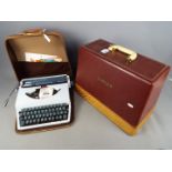 A vintage Singer 185K sewing machine in case and an Imperial portable typewriter, also cased.