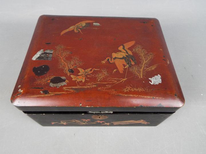 A Japanese lacquered box containing predominantly costume jewellery including bead necklaces, - Image 4 of 5
