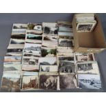 In excess of 500 UK topographical postcards with a few foreign and subject to include real photos,