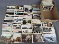 In excess of 500 UK topographical postcards with a few foreign and subject to include real photos,